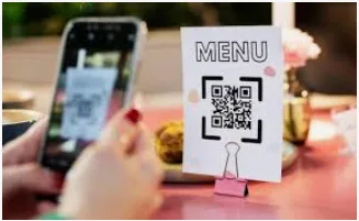 Diner scanning a QR code for allergen information