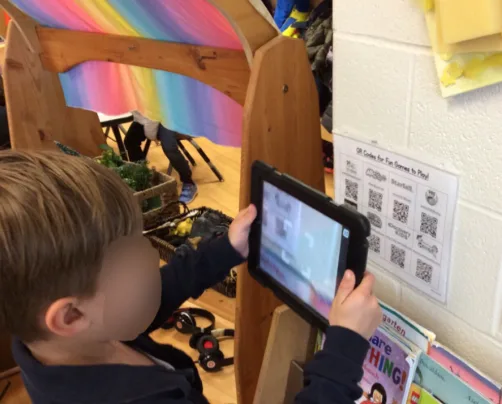 Student scanning QR at school canteen